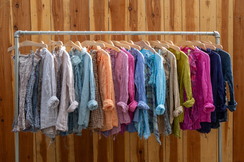 An array of spring clothing items on a rack
